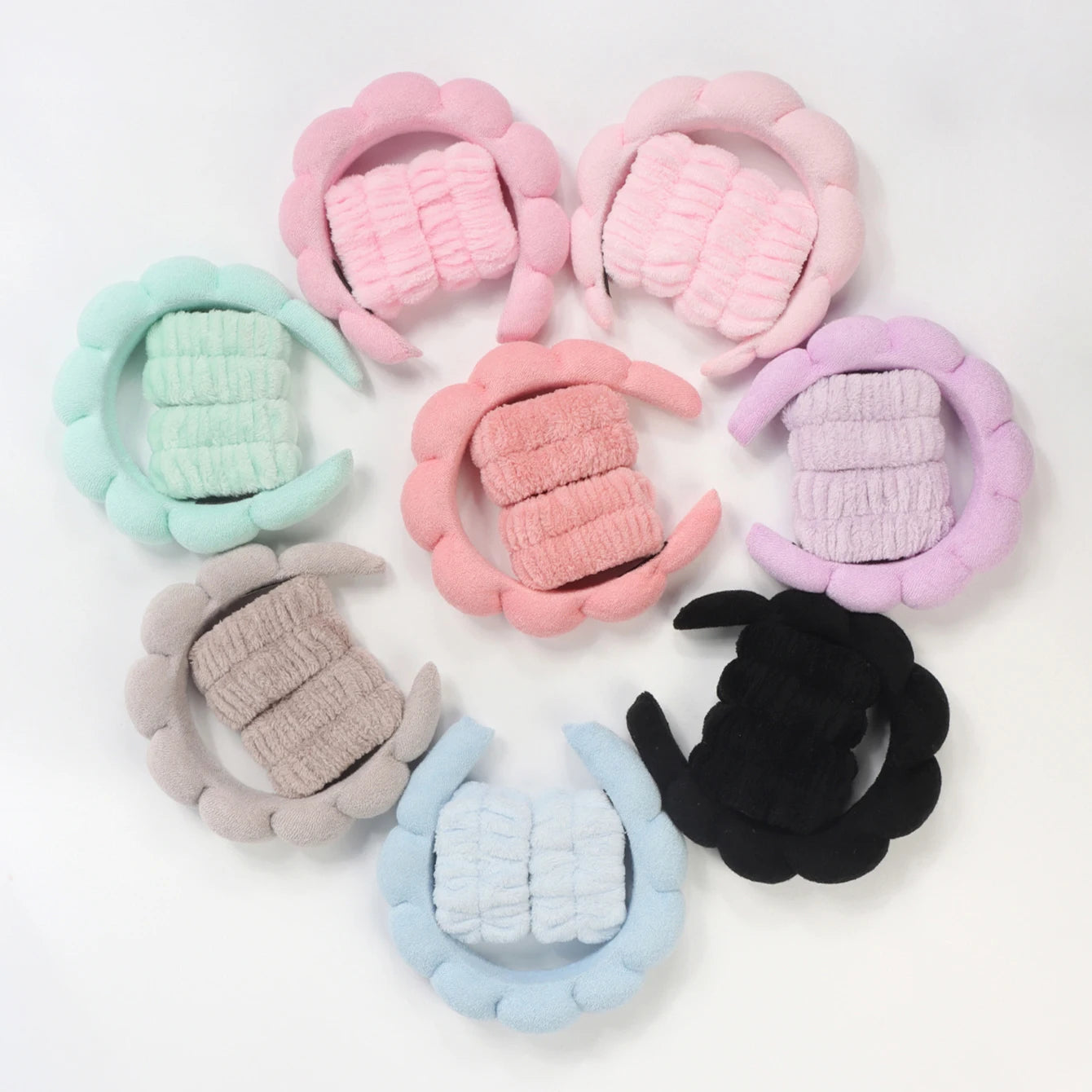 Set of colorful pet toys on a white background